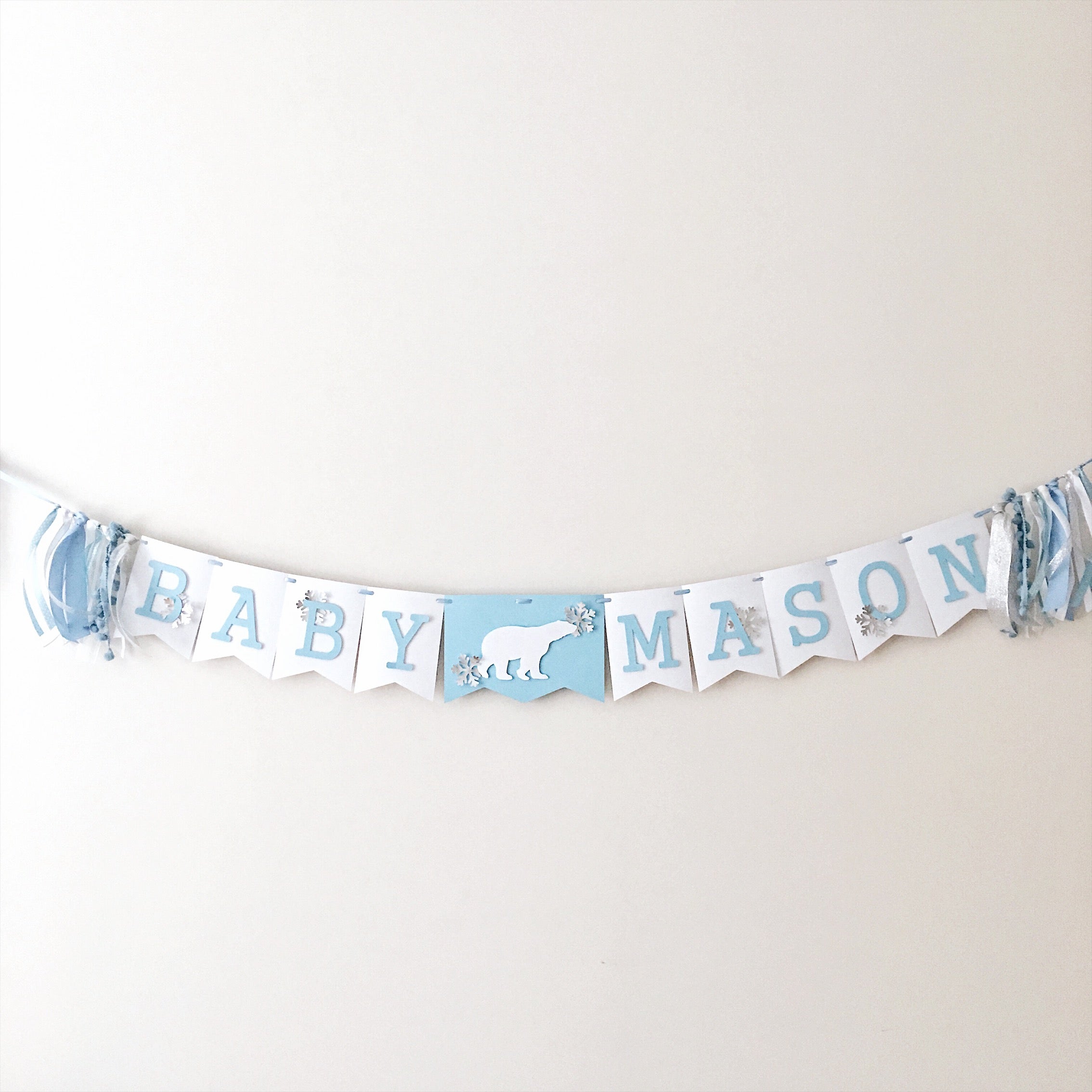 Polar Bear Baby Shower Name Banner in white and dusty blue for a winter gender reveal party.