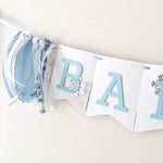 Polar Bear Baby Shower Name Banner in white and dusty blue for a winter gender reveal party.