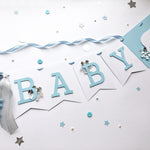 Polar Bear Baby Shower Name Banner in white and dusty blue for a winter gender reveal party.
