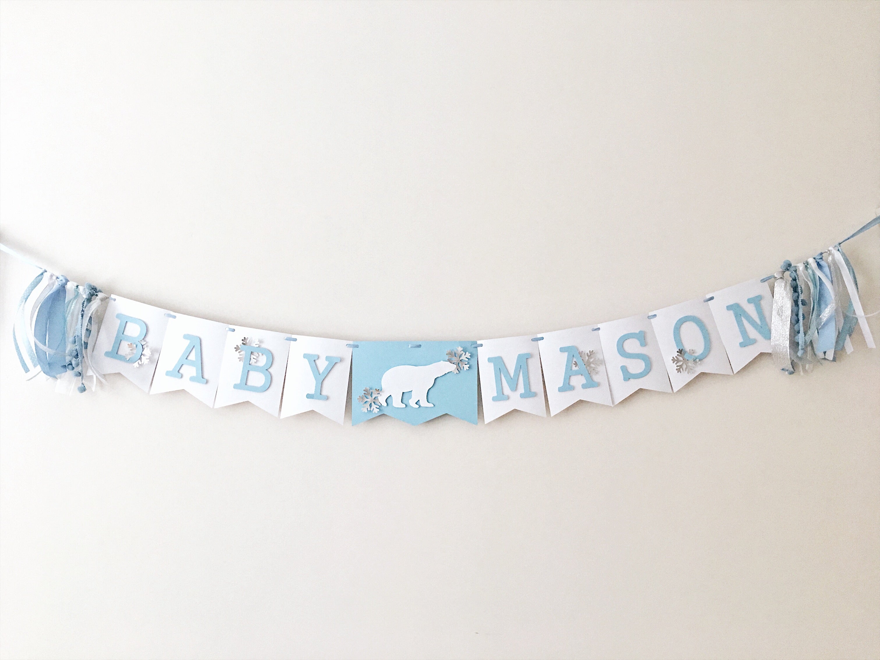 Polar Bear Baby Shower Name Banner in white and dusty blue for a winter gender reveal party.