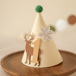 Beige party hat with deer design and snowflake 