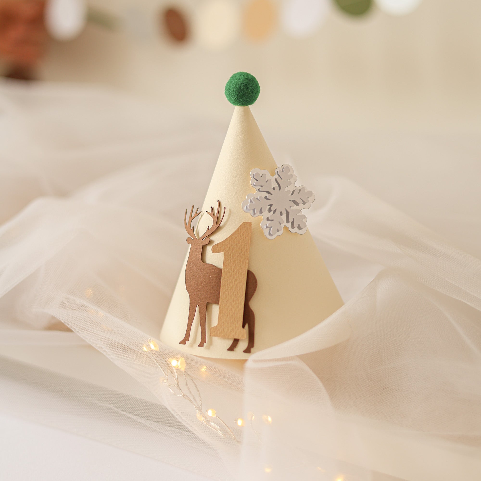 Children's party hat with deer design and number 