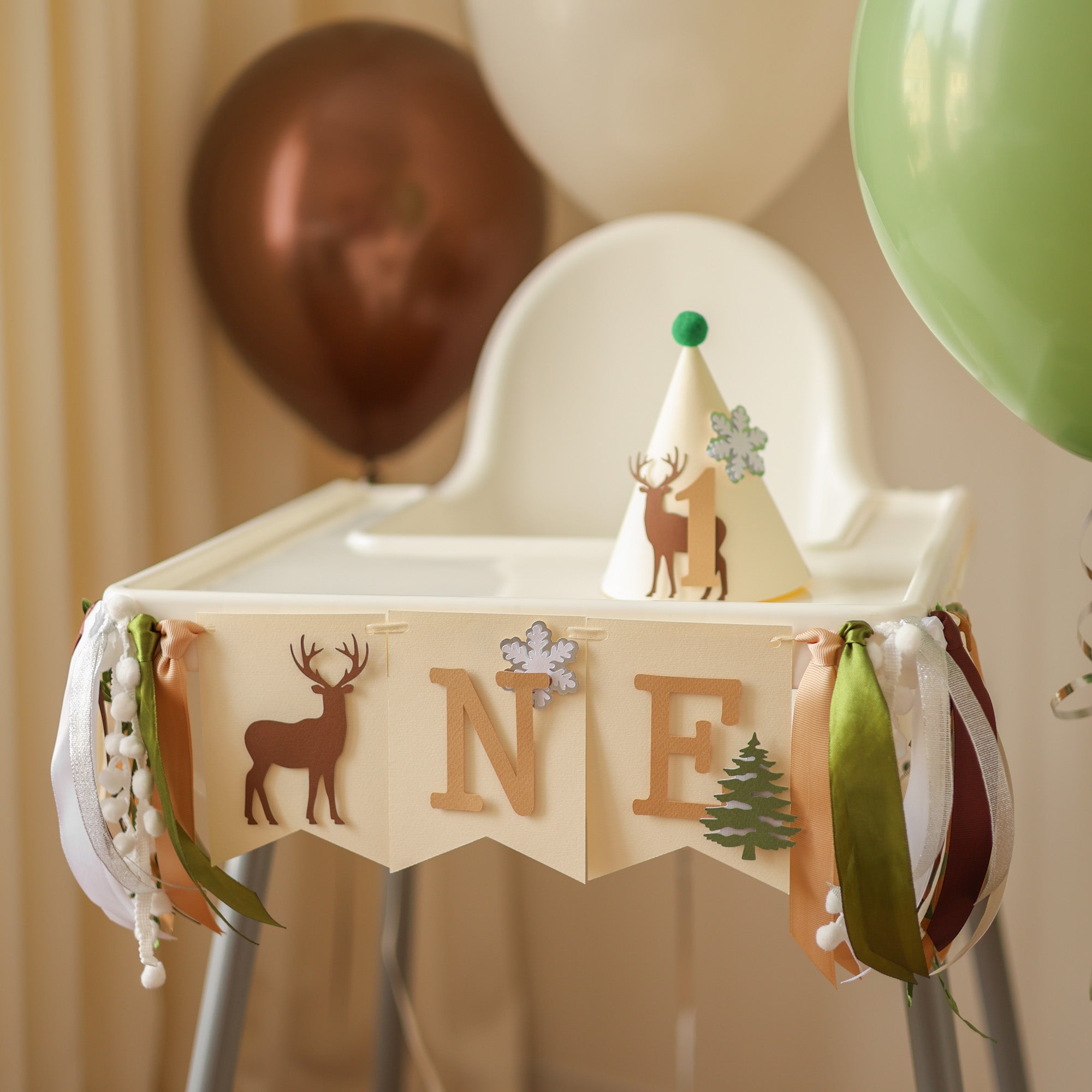 Winter deer highchair banner for 1st birthday cake smash.
