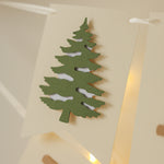Winter banner with deer silhouettes and snowy background.