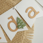 Winter banner with deer silhouettes and snowy background.