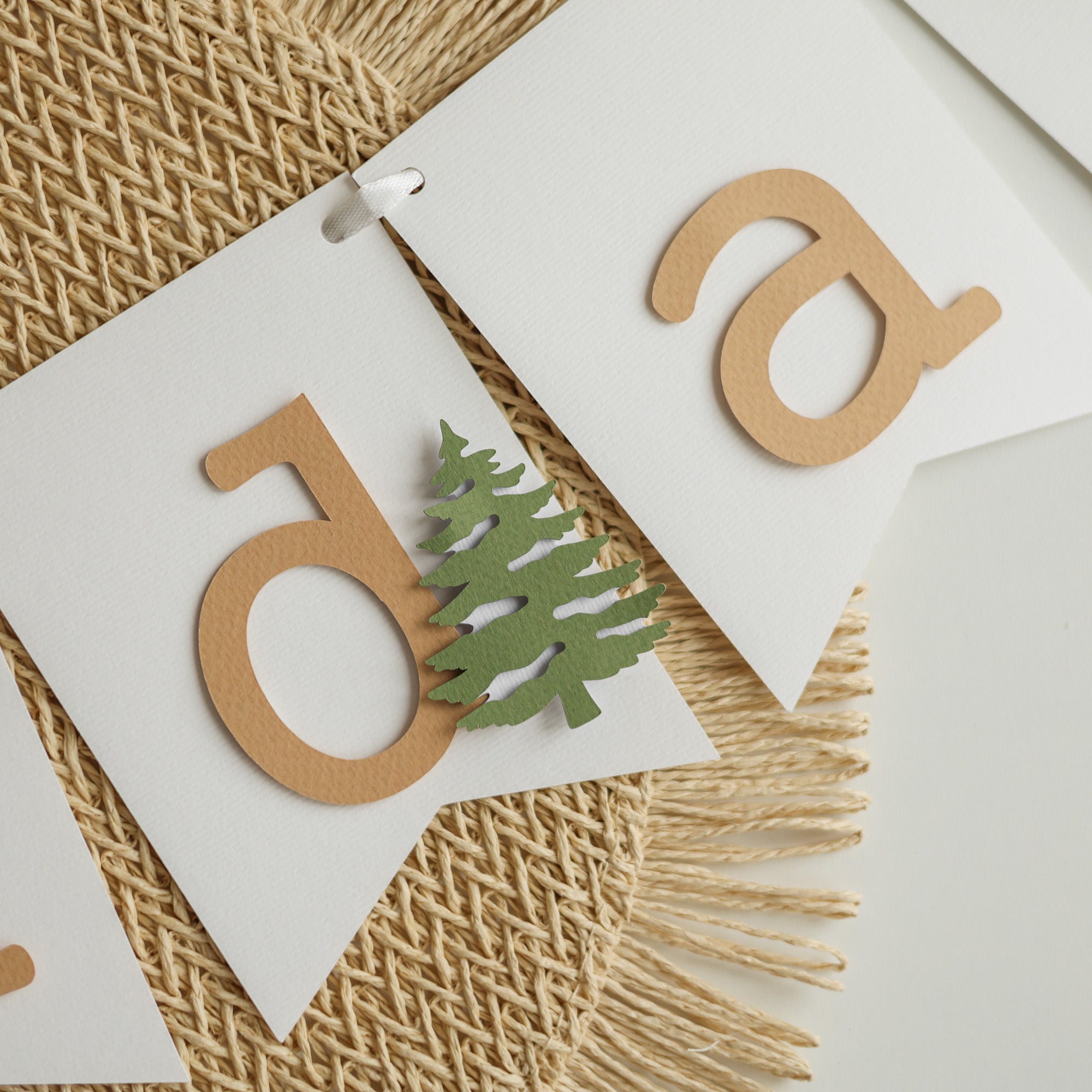 Winter banner with deer silhouettes and snowy background.