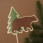 Woodland First Birthday centerpiece with green number one and forest animals including fox and bear for Respect The Locals party theme.