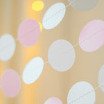 Pastel pink paper dot garland hanging for coquette bow party decor