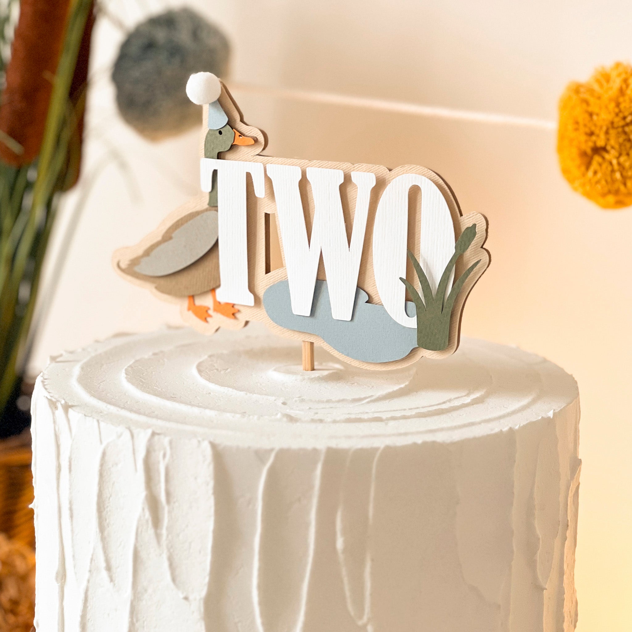 White cake with Duck Duck Two topper for boy 2nd Birthday party