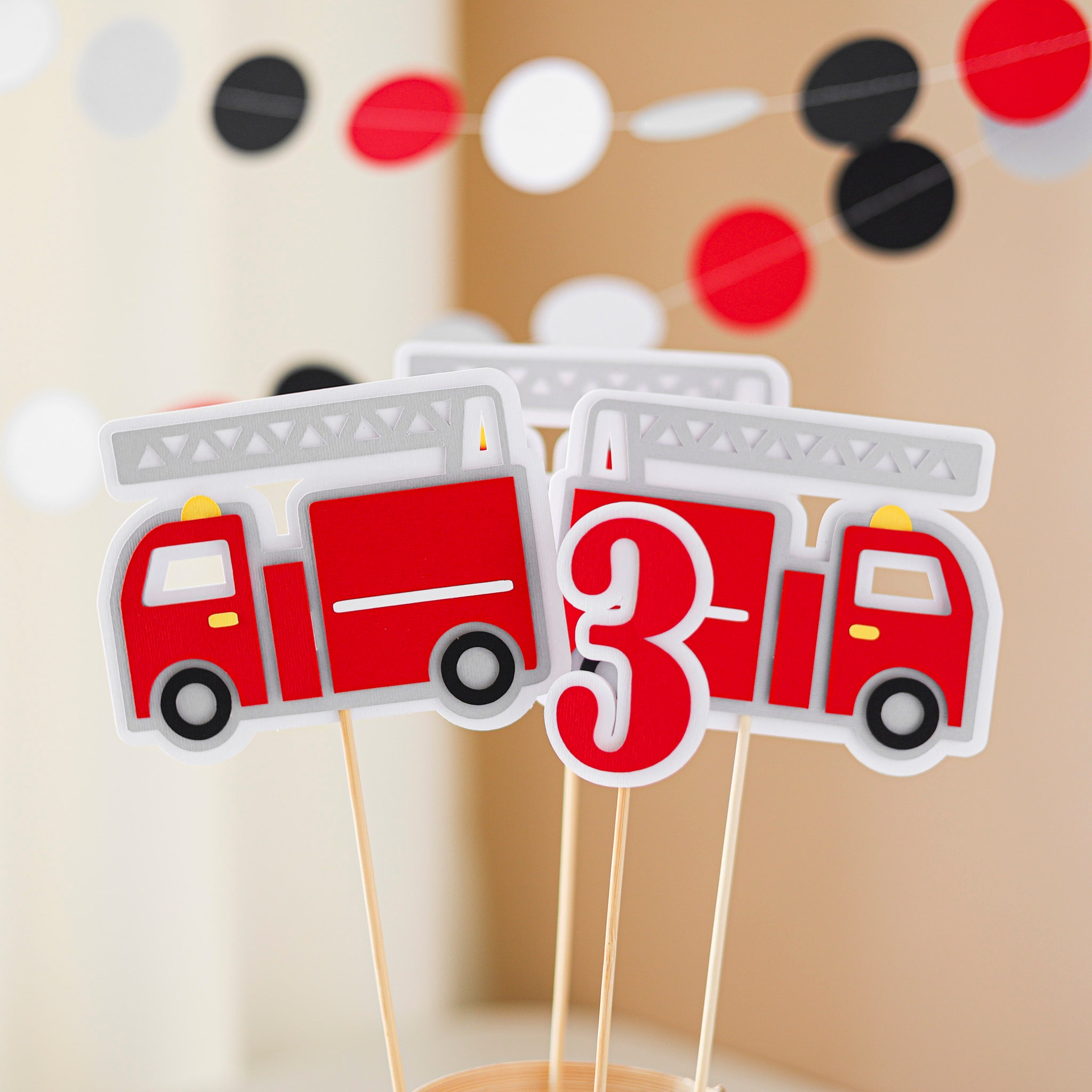 Fire truck-themed birthday cake toppers