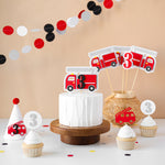 Decorative centerpieces with fire truck design and number.