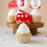 Cupcake with a red fire truck topper