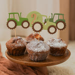 Close up detail of high quality cardstock tractor cupcake topper showing green farm design