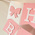 Detailed paper bow flag on pink birthday garland FunstaCraft