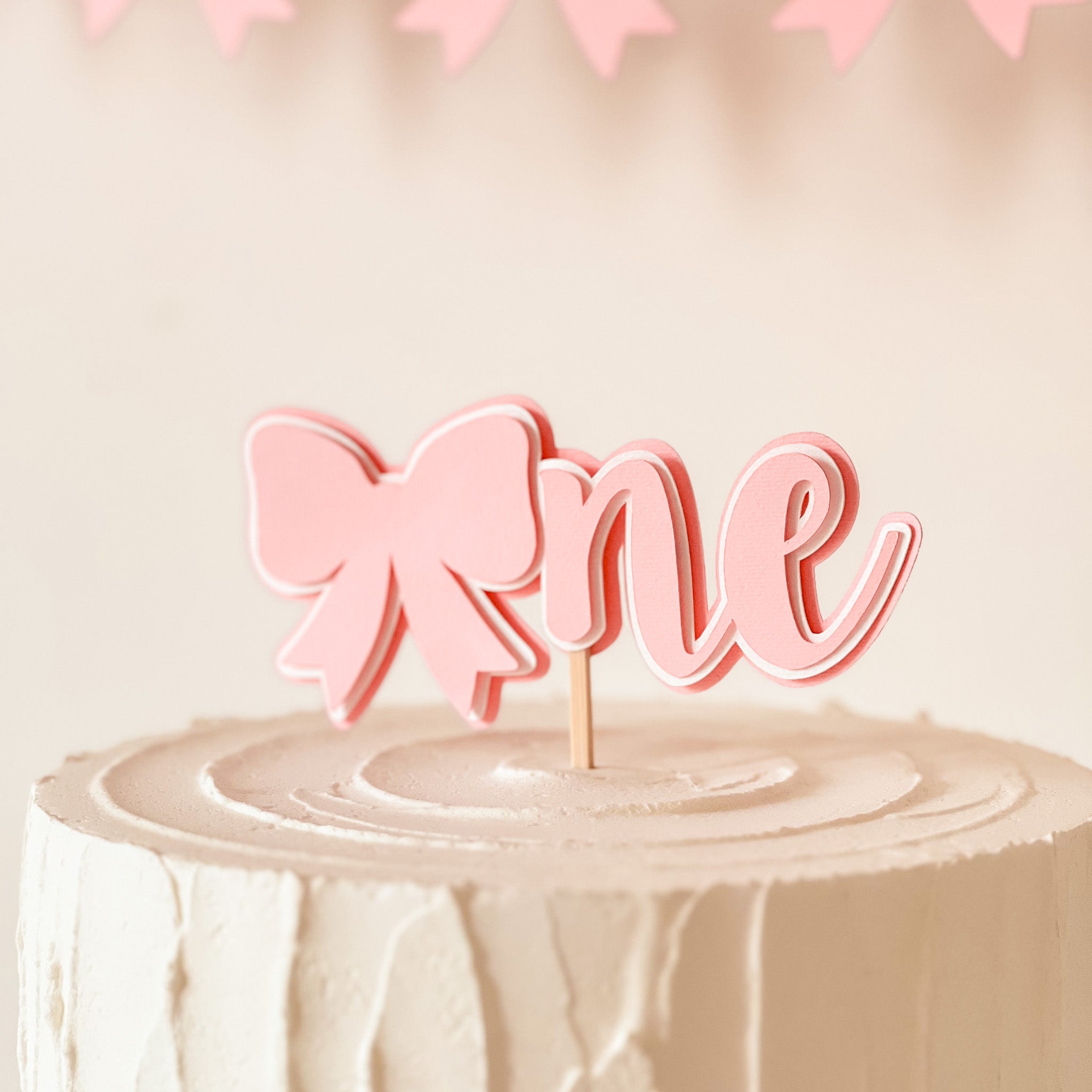 Handcrafted 3D pink bow cake topper for baby shower and birthday cake
