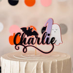 Halloween themed cake topper with custom baby name