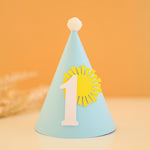 Light blue birthday hat with a number '1' and sun design
