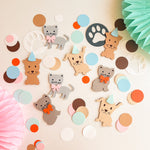 Colorful animal-themed decorations including cats, dogs, and paw prints on a light background.