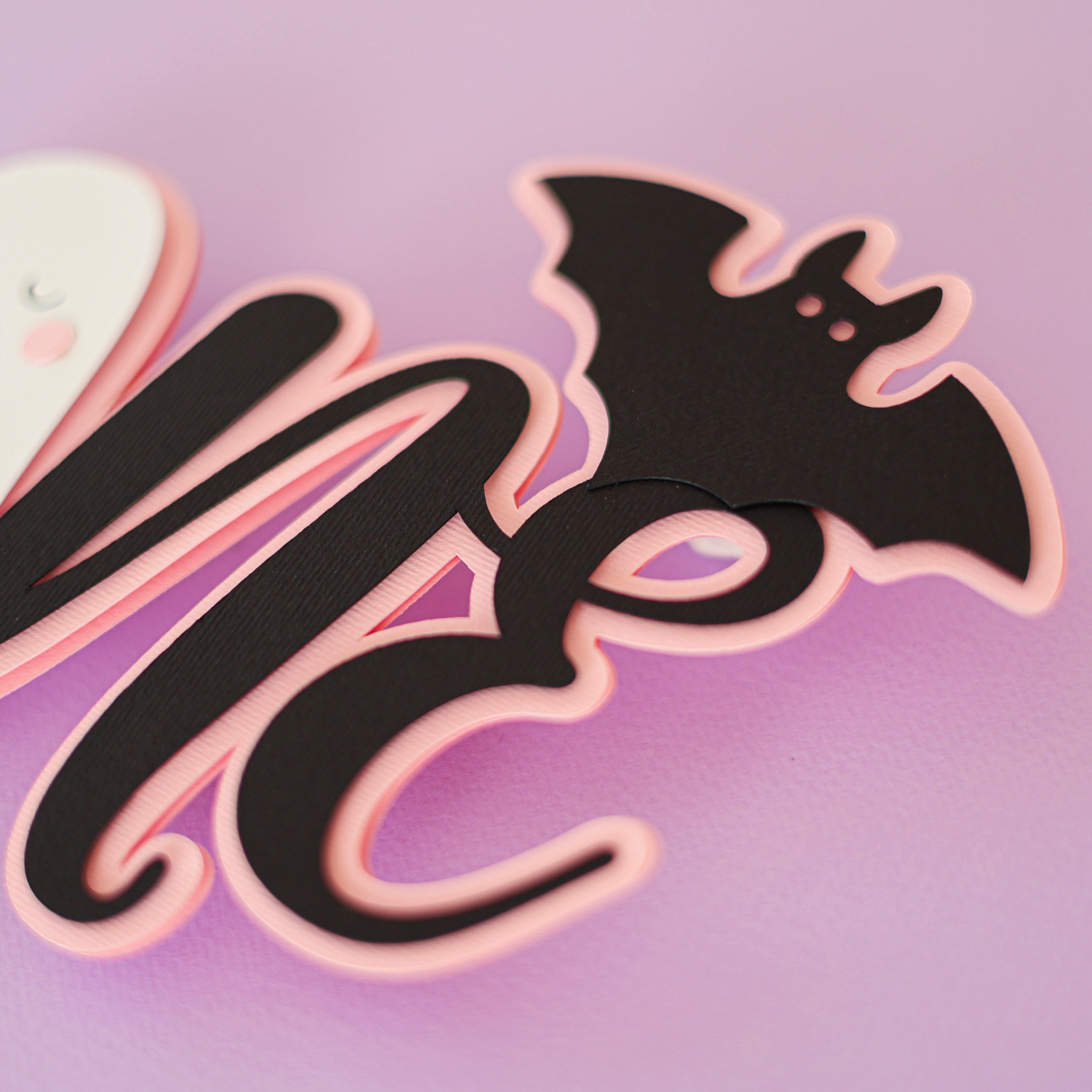 Black bat shaped topper