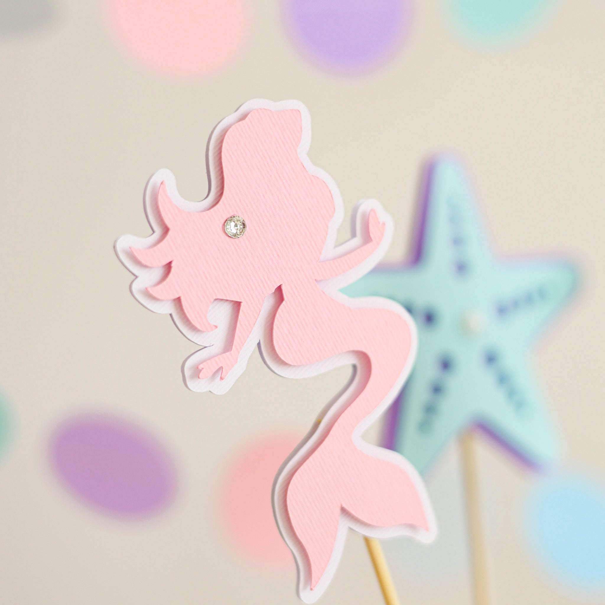 Sweet pink paper mermaid centerpiece stick with tiny rhinestone detail for mermaid themed photo smash cake