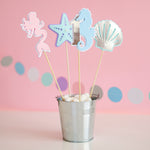Handmade pastel mermaid 1st birthday centerpiece sticks set with pink mermaid, seahorse number 1, starfish, and silver seashell table decor