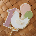 Decorative cake topper with a chicken and balloons 